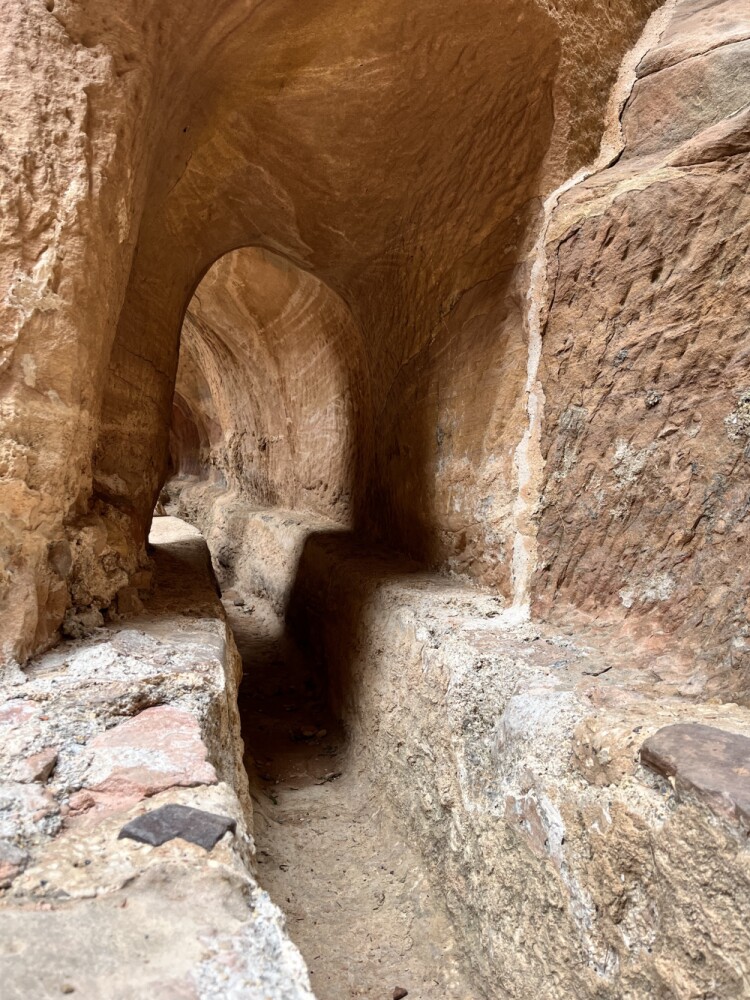 Artifcts Ellen Goodwin's picture of a water channel carved into the cliffside, Petra, Jordan