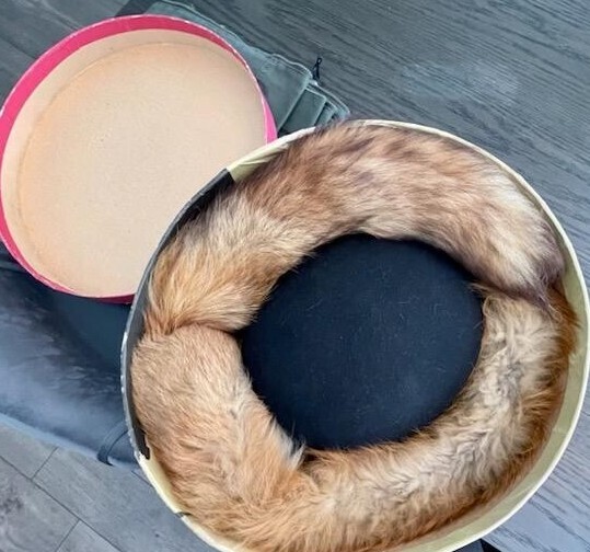 Bowler hat in hat box, padded with fox scarf